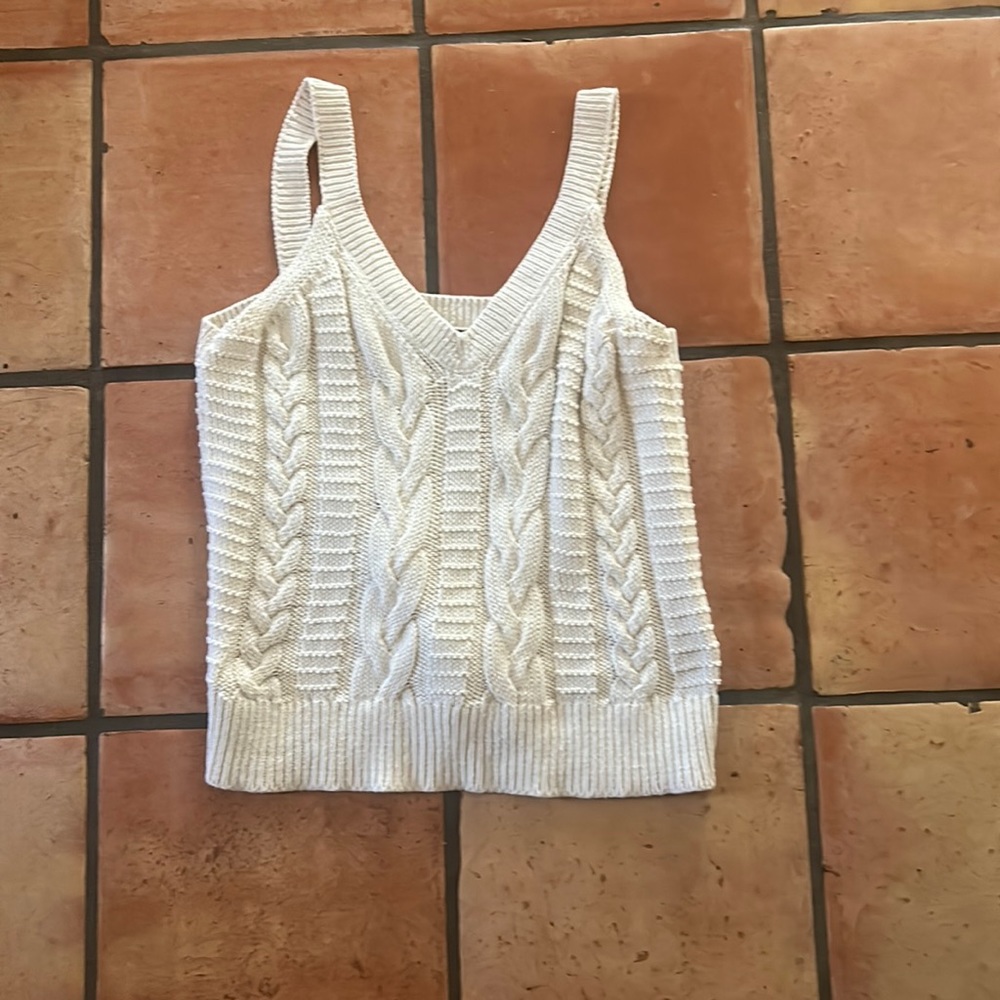 Off white Sweater tank.  Looks good with a blazer or tucked into jeans.